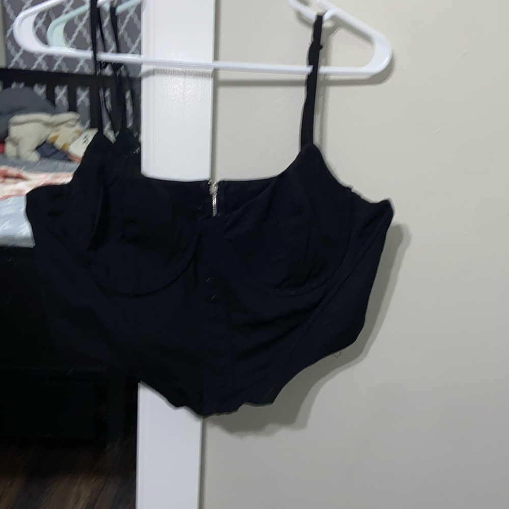 Black going out top